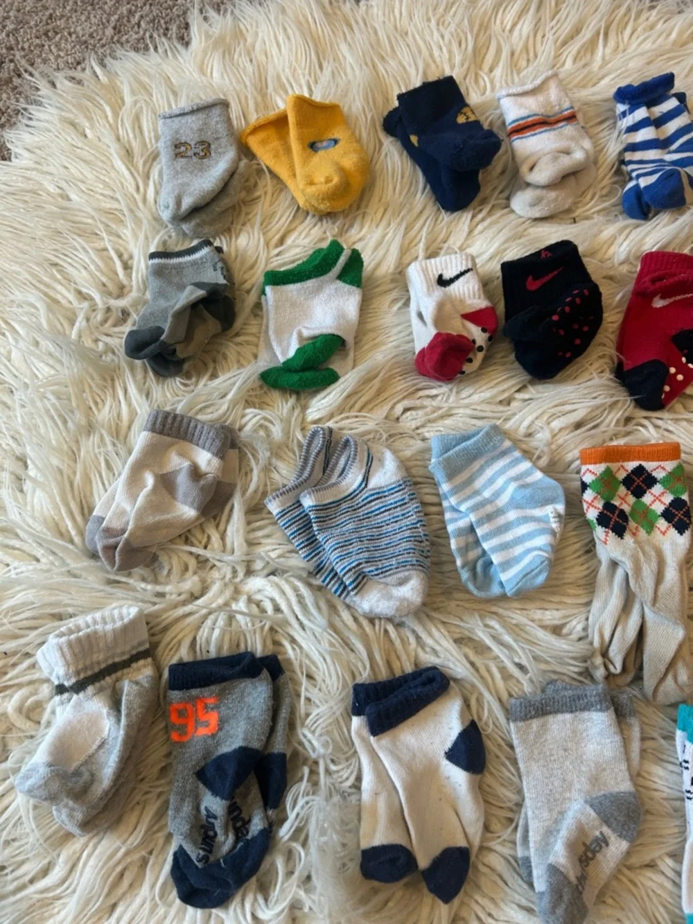 Baby sock lot of diff size med to 12 month-ish Assortment - 31 pairs